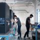 Two men working with Markforged 3D Printers